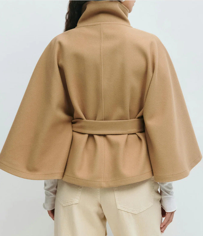 Women's belted layering coat in green, side view
