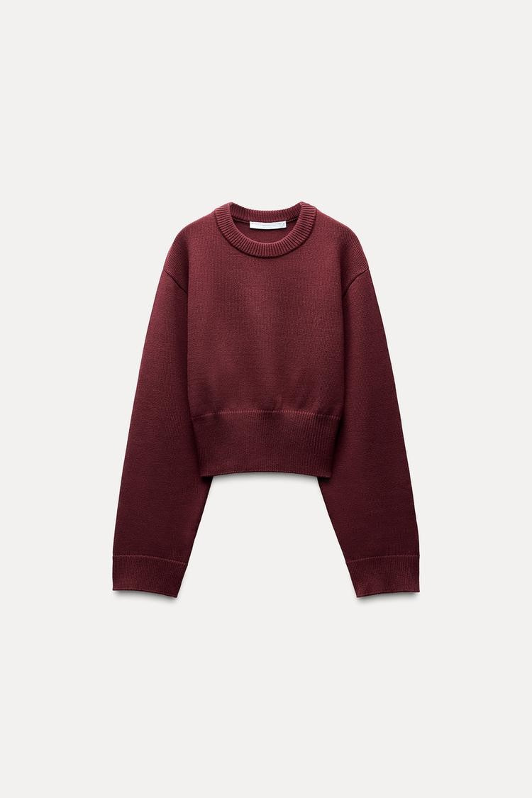 Women's crew-neck long sleeve jumper in red, detail view