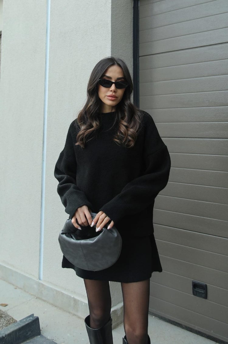 Women's crew neck long sleeve skirt set in black, back view