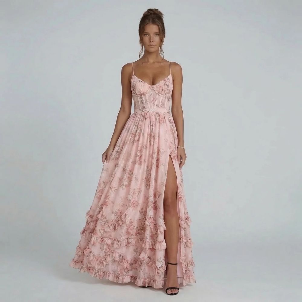 Women's floral corset tiered ruffle maxi dress in pink, side view with high slit