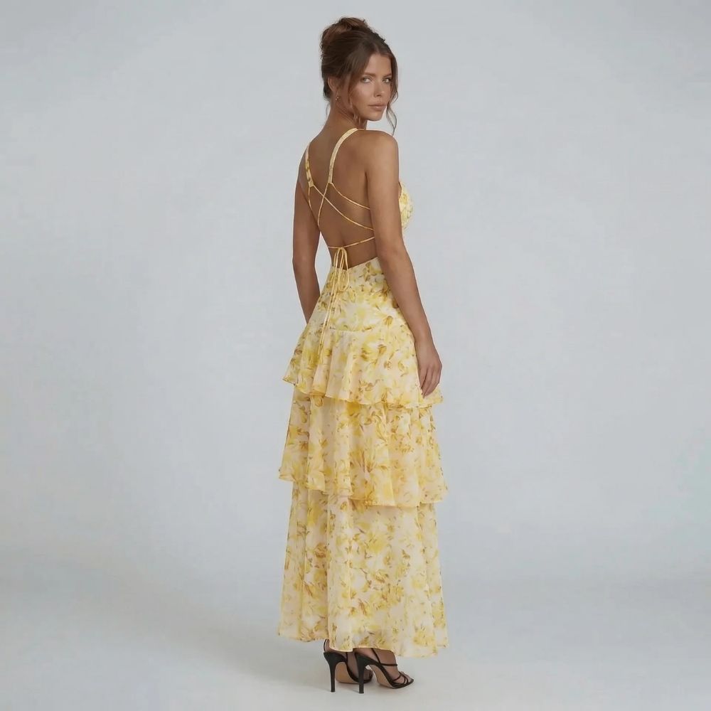 Women's floral v neck tiered ruffle maxi dress in yellow, back view with lace-up detail