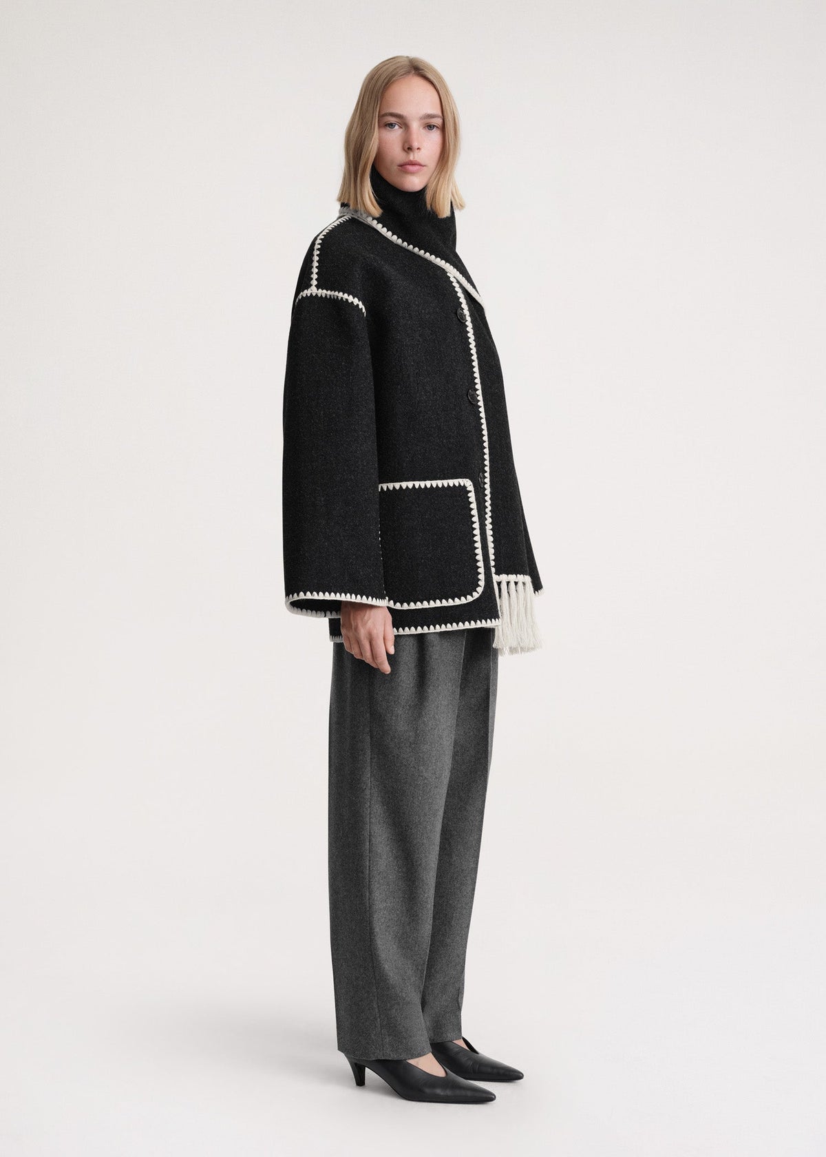 Women's formal high-neck wrap coat in black, side view