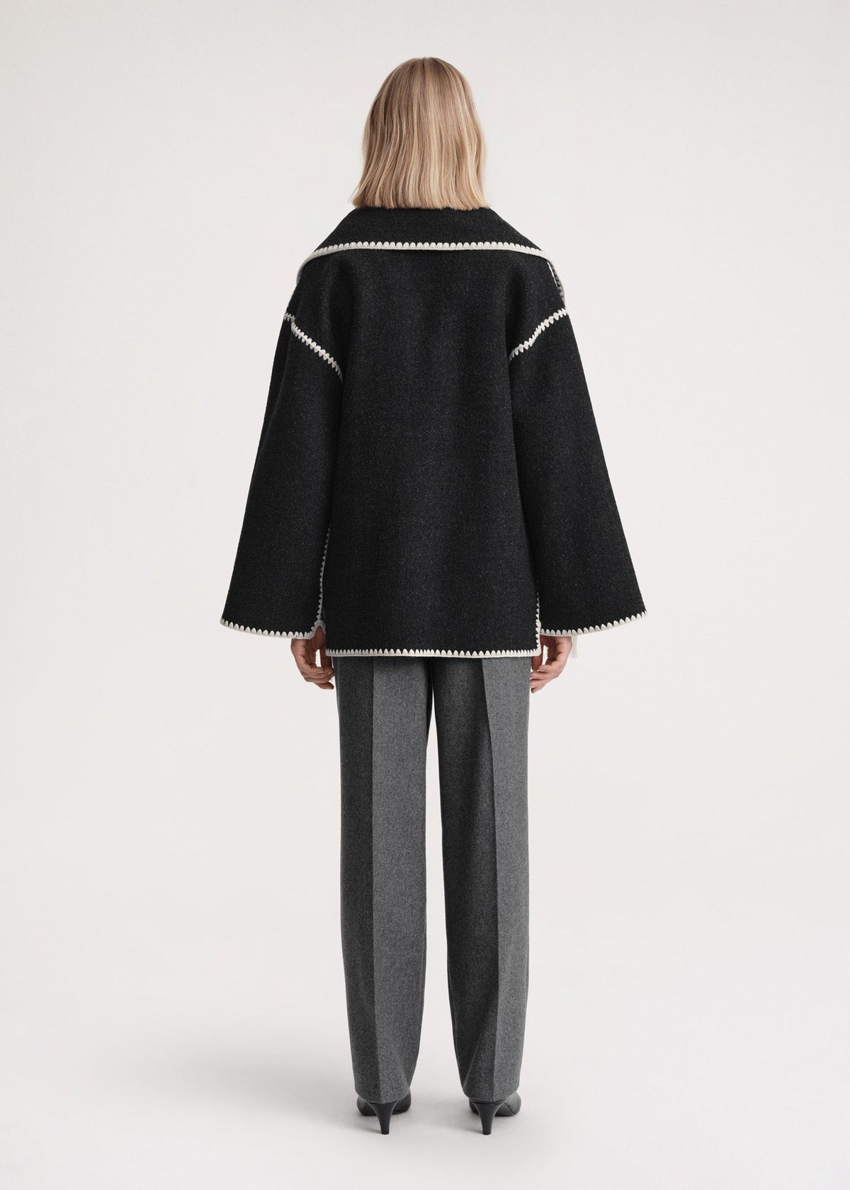 Women's formal high-neck wrap coat in black, back view