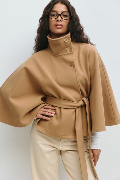 Women's funnel neck cape sleeve draped coat in brown, front view