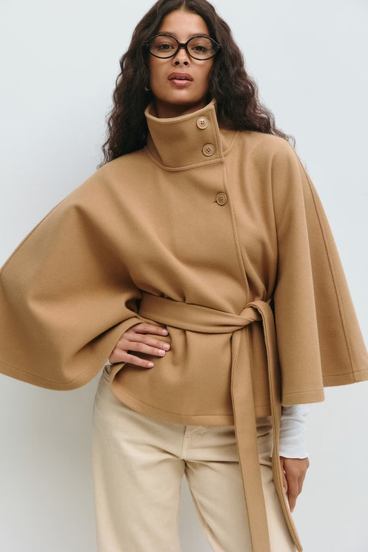 Women's funnel neck cape sleeve draped coat in brown, front view