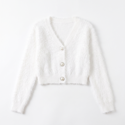 Women's fuzzy cropped pearl button cardigan in white, flatlay view