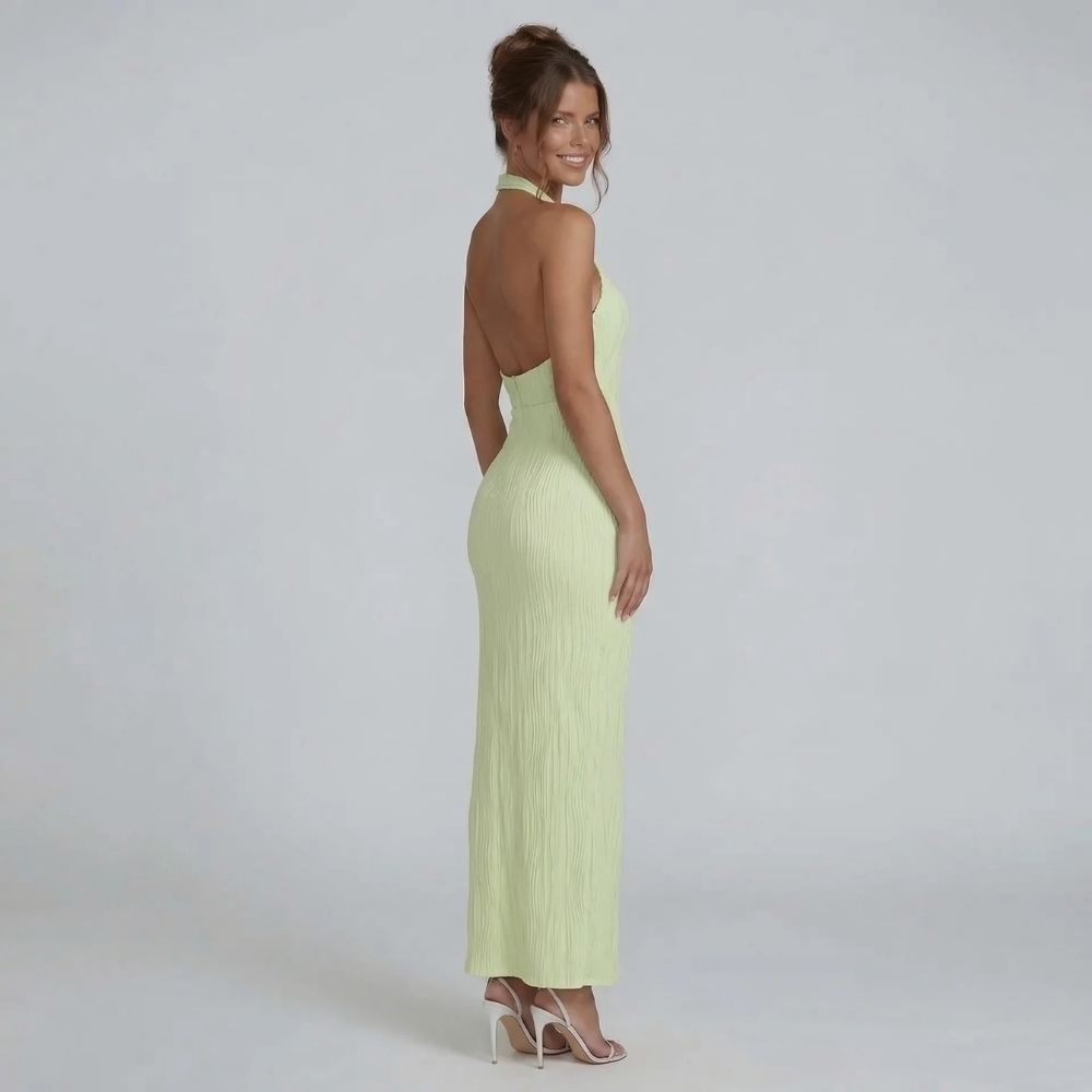 Women's halter wrap maxi dress in emerald green, open back view