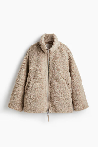 Women's high collar long sleeve coat in beige, front view