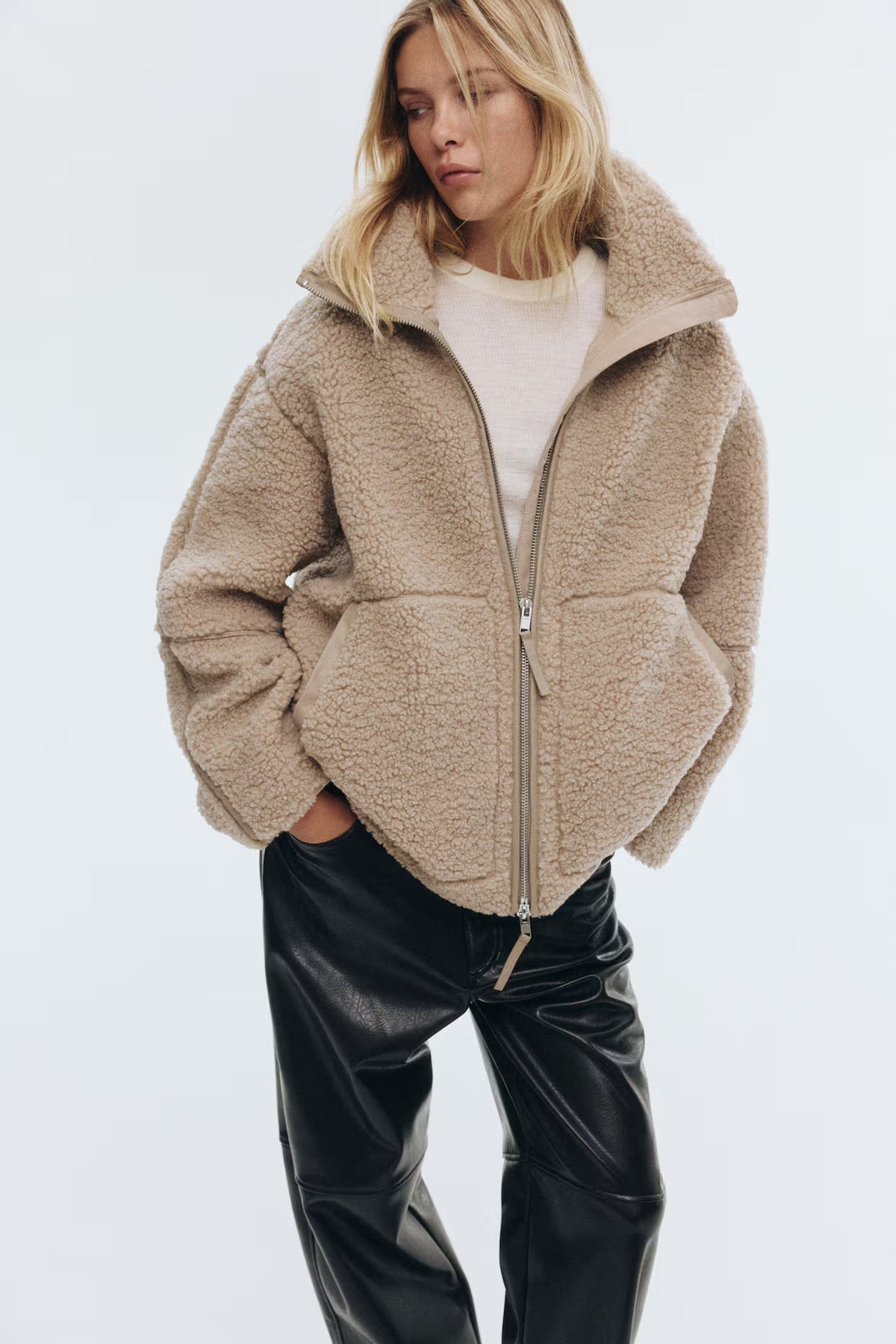 Women's high collar long sleeve coat in beige, back view