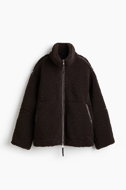 Women's high collar long sleeve coat in chocolate, side view