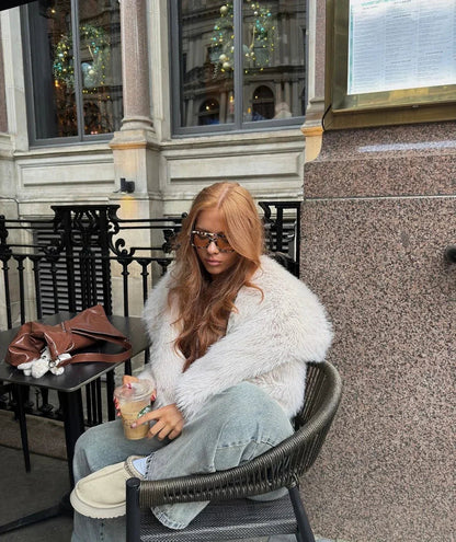 Women's oversized faux winter coat in gray, back view