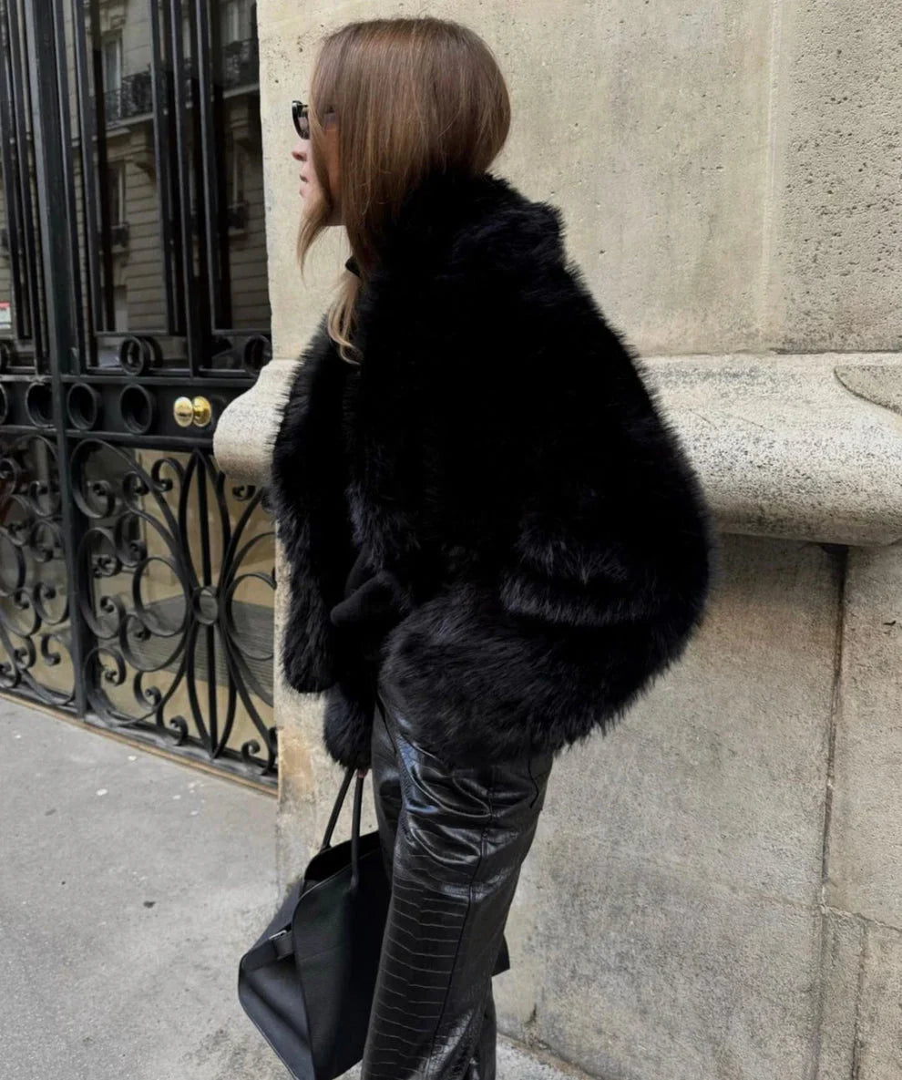 Women's oversized layering coat in black, back view
