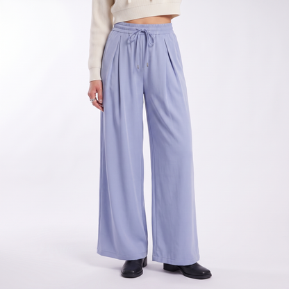 Women's pleated drawstring wide leg trousers in periwinkle, front view