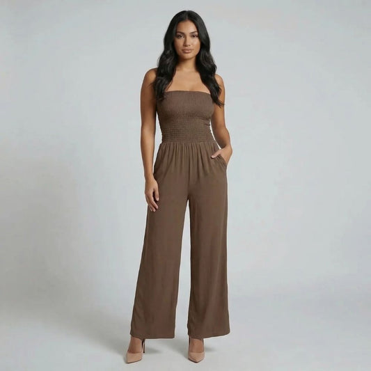 Women's smocked strapless wide leg jumpsuit in brown, front view