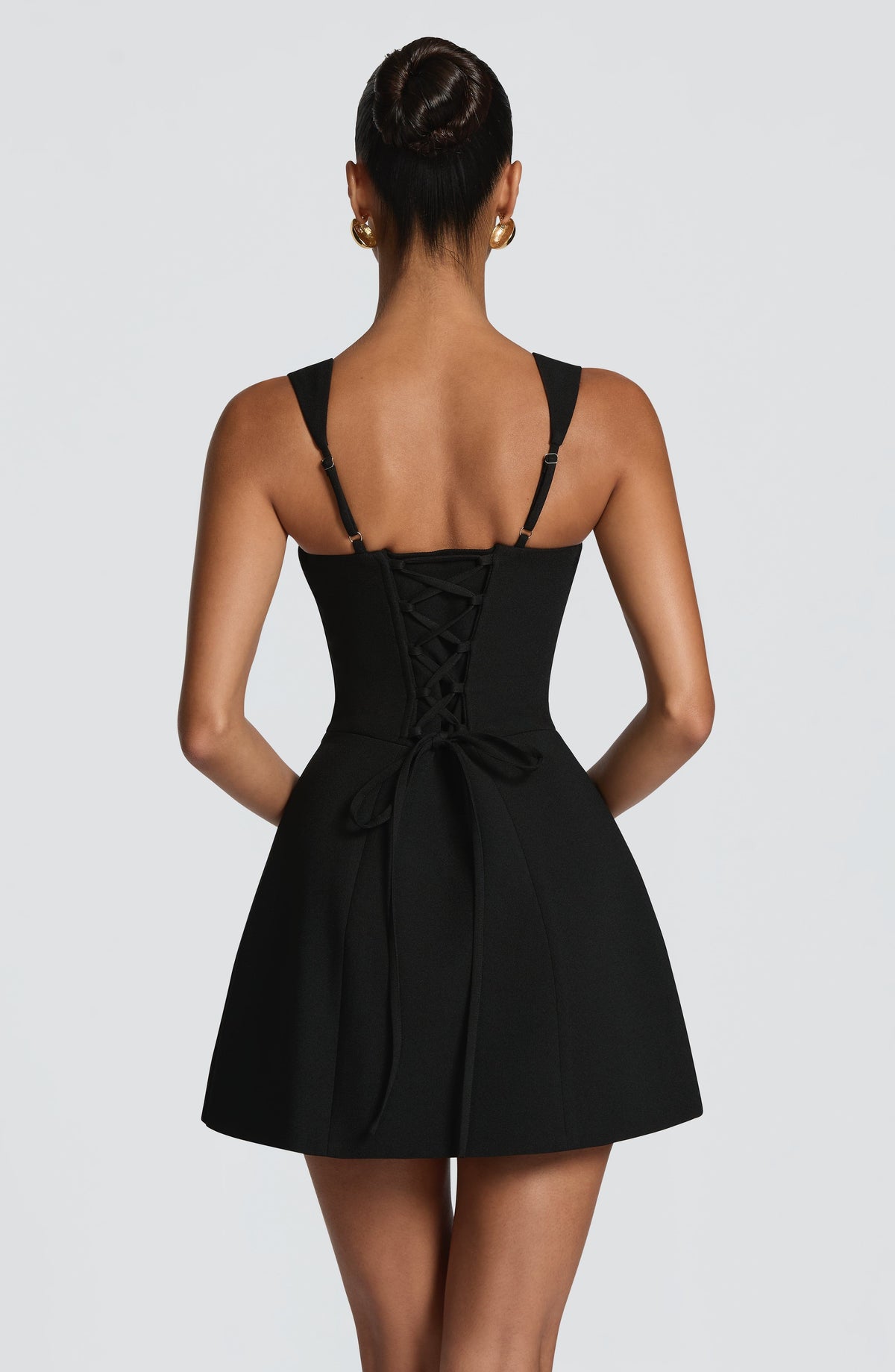 Women's square neck mini dress in black, back view