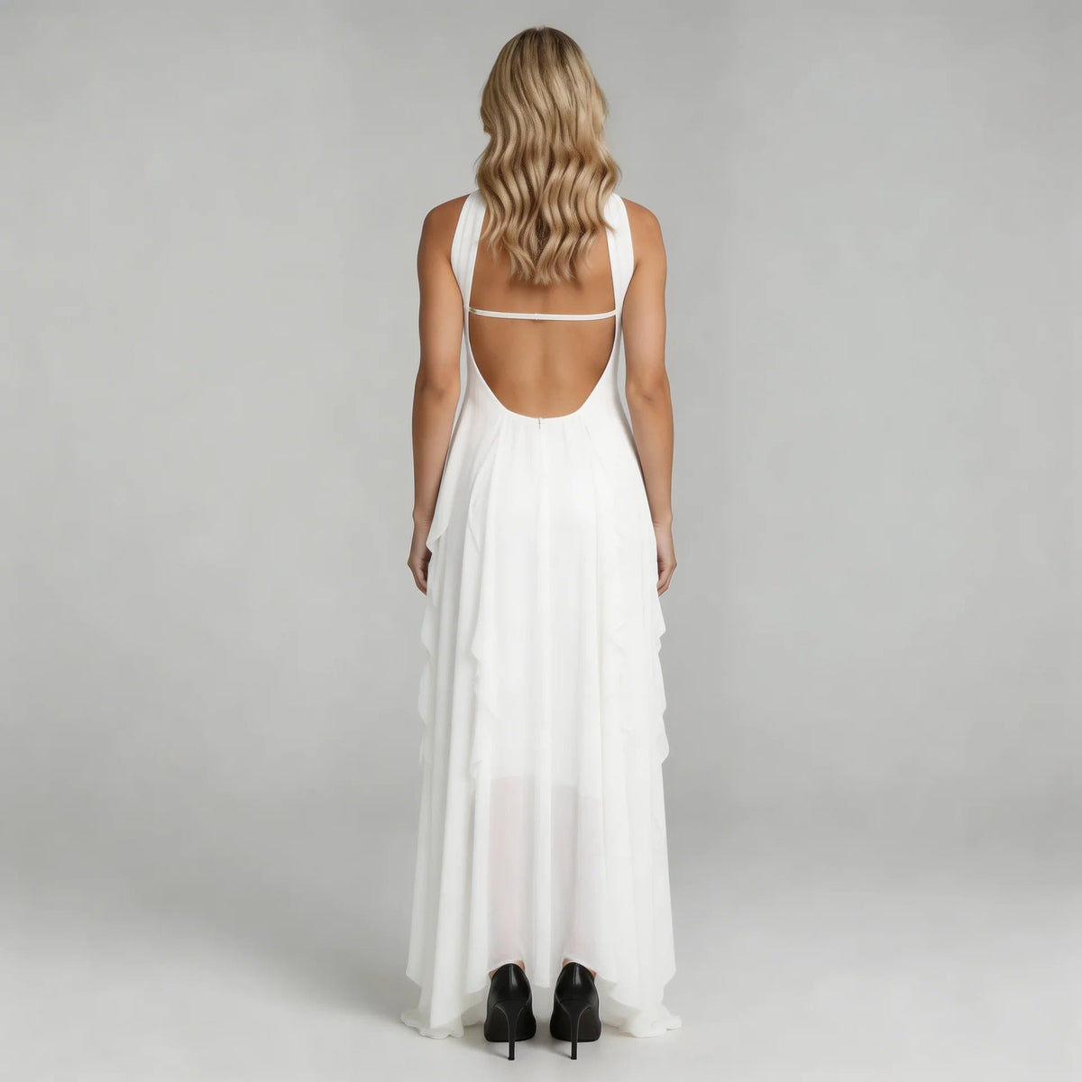 Women's strapless ruffle maxi dress in ivory white, open back view