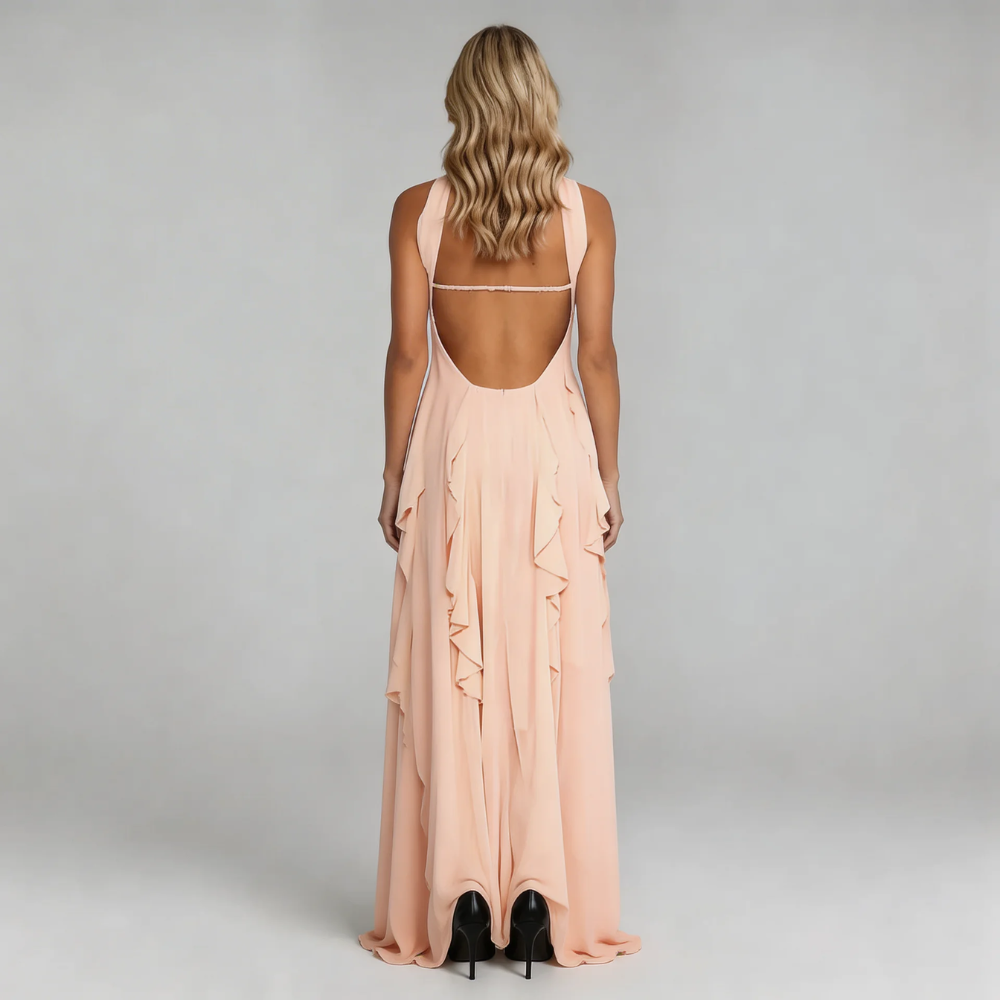 Women's strapless ruffle maxi dress in soft peach, open back view