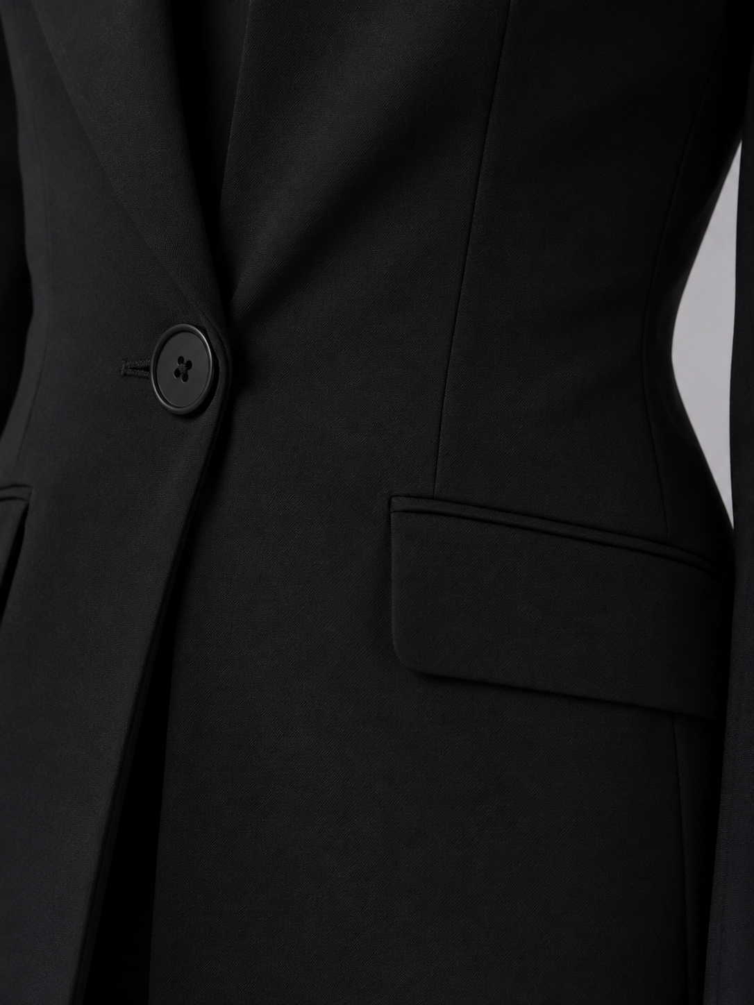 Women's tailored collarless wide leg suit set in black, detail view