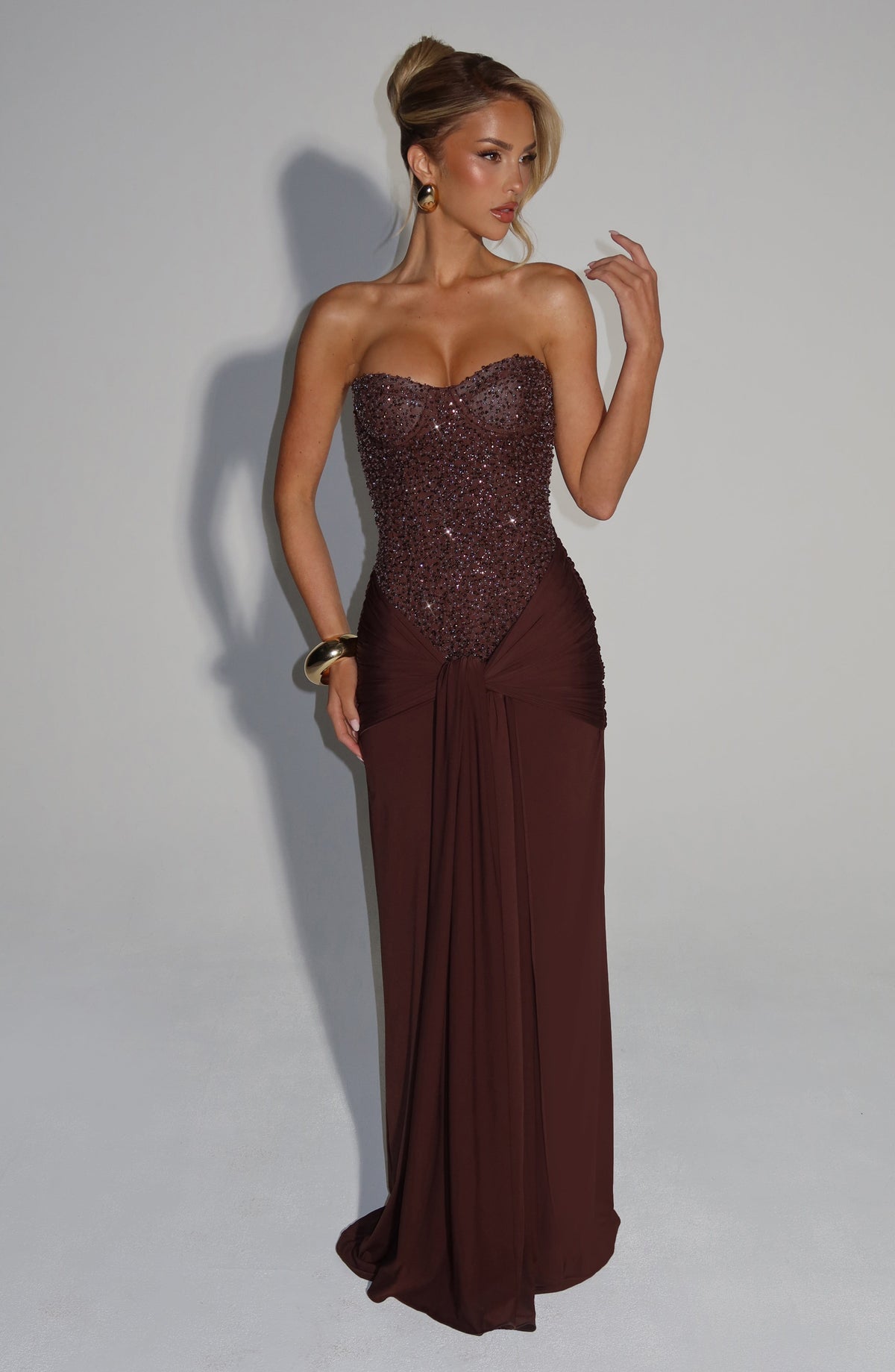 Women's wedding guest corset maxi dress in brown, side view