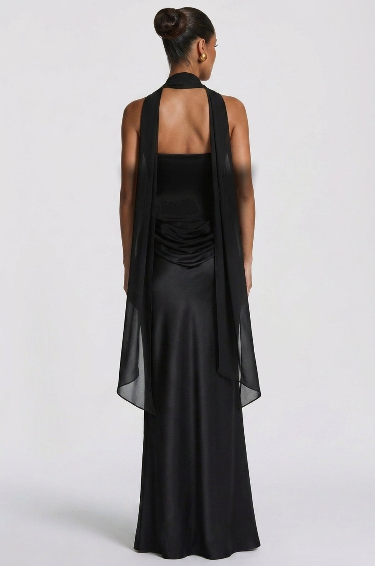 Women's wedding guest cowl strapless maxi dress in black, side view