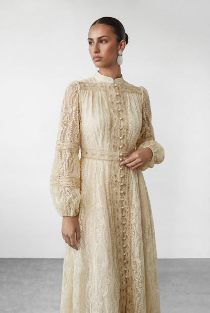 Women's wedding guest puff sleeve button maxi dress in beige, side view
