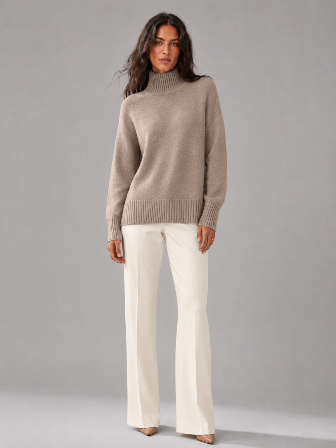 Women's oversized turtleneck jumper in camel, front view