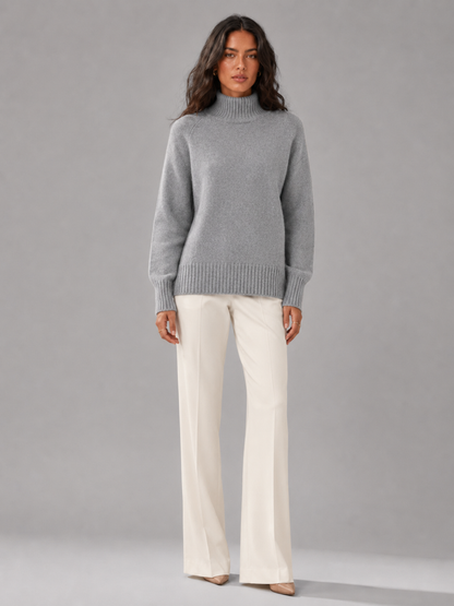 Women's oversized turtleneck jumper in grey, front view